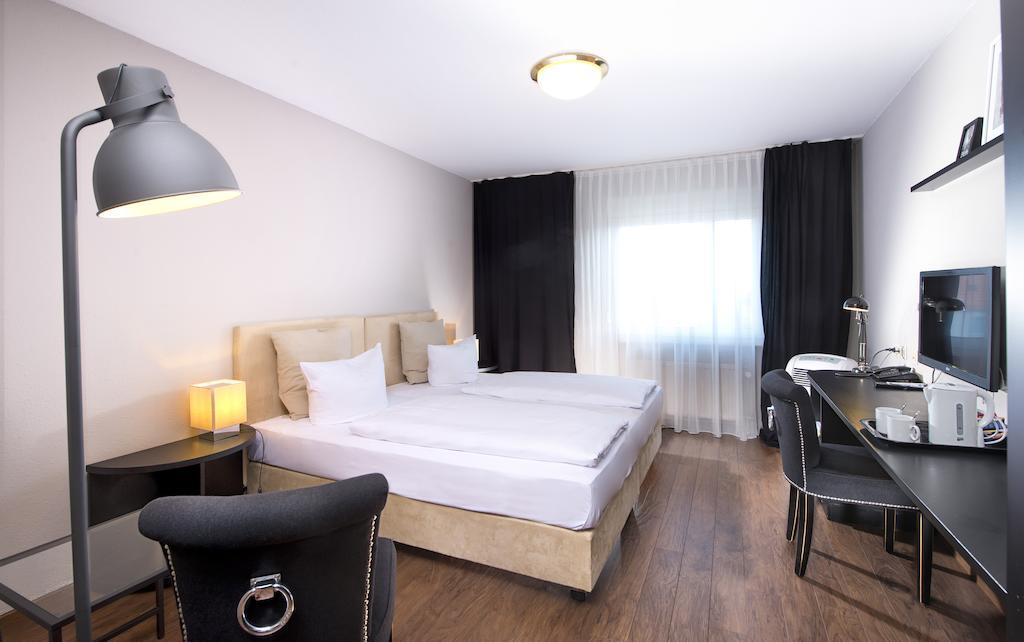 Tryp By Wyndham Bremen Airport Hotel Kamer foto